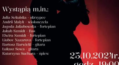 para tańcząca tango w zaciemnionym pomieszczeniu z czerwonymi światłami zakreślające sylwetki tancerzy 
