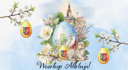 Kolorowa grafika w tle miasto Lubliniec na pierwszym planie świąteczna pisanka z namalowanym urzędem miejskim obok leży wielkanocny baranek całość oprawiona kwitnącymi wiosennymi gałązkami 