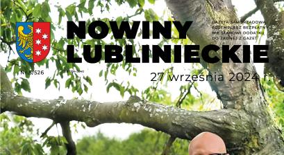 Burmistrz miasta z kotem Czesławem oraz zastępca burmistrza z kotem Pedrem w ogrodzie na tle drzew 
