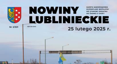 grupa protestujących przechodzących na przejściu przez DK46 na pierwszym planie jeden z protestujących z hasłem protestu "zostawcie nam obwodnice" 