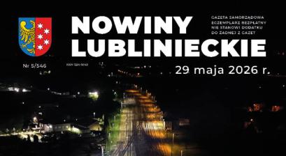 zdjęcie z drona panoramy miasta Lublińca nocą na pierwszym planie podświetlony wiadukt kolejowy w ciągu ulicy Powstańców Śląskich